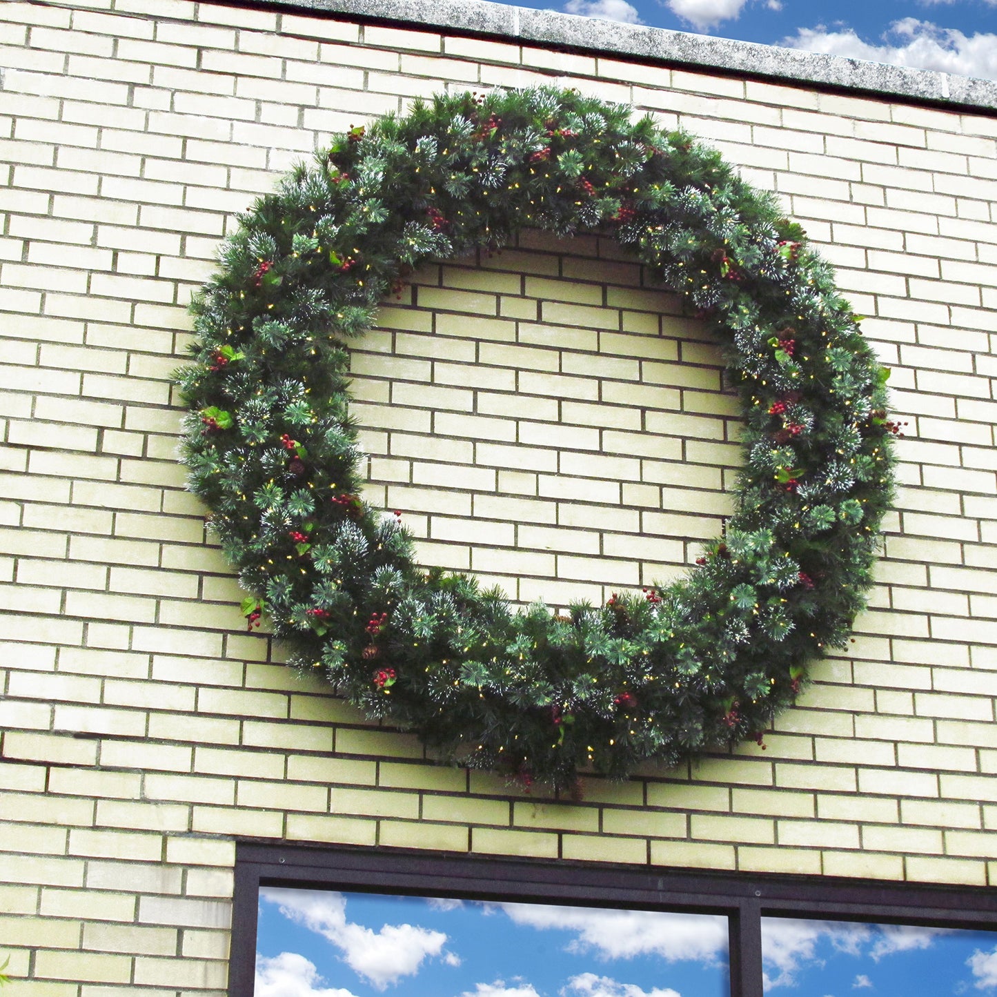 National Tree Company Pre-Lit Artificial Christmas Wreath, Green, Crestwood Spruce, White Lights, Decorated with Pine Cones, Berry Clusters, Frosted Branches, Christmas Collection, 24 Inches